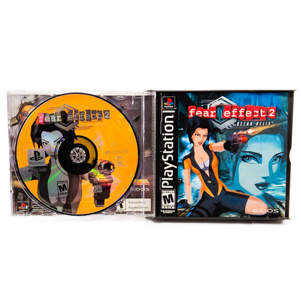 Fear Effect 2 Retro Helix PlayStation 1 Like New CIB - Open Case Showing Disc 1 And Manual