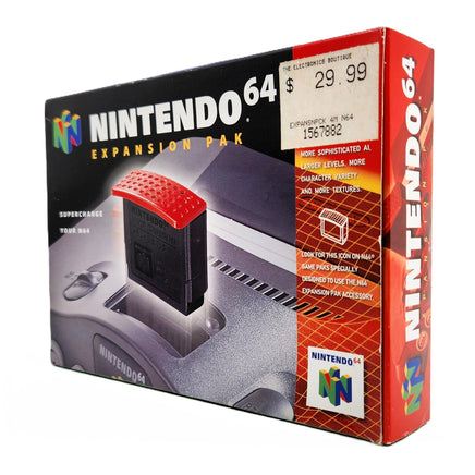 Nintendo 64 Expansion Pak retail box shown at a three-quarter angle on a plain white background. The packaging is predominantly black and red-orange with the Nintendo 64 logo, product name, and a pictured red-and-black cartridge.