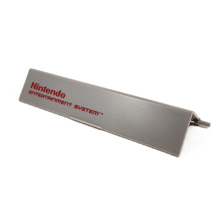 NES Flip Door Cover Replacement Cartridge Flap For Original Nintendo NES Console Brand New Loose - Angled View Close Up Showing Logo
