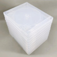 PS3 Replacement Game Case 10-Pack - Empty Disc Case [Clear] - Ten cases stack showing back, brand new condition, loose