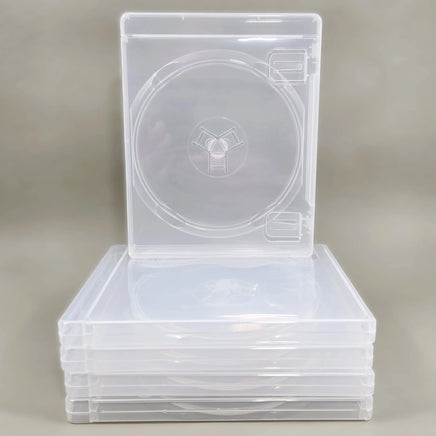 PS3 Replacement Game Case 5-Pack - Empty Disc Case [Clear] - Cases shown stacked with one facing front, brand new condition, loose