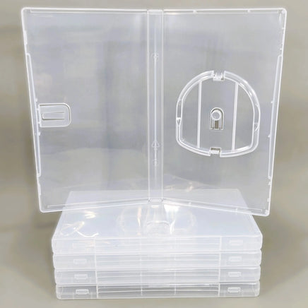 Sony PSP Replacement Game Case 5-Pack – Empty Clear UMD Disc Storage Case - View showing open case sitting on top of a stack of neatly arranged cases