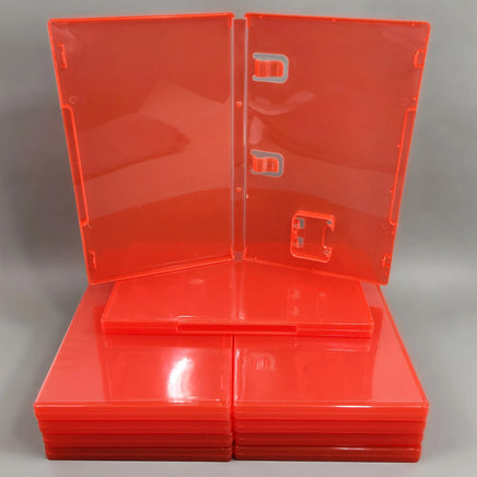 Nintendo Switch 2 Replacement Game Case 10-Pack - Empty Cartridge Case [Red] - Alternate view of one case sitting on a stack of cases opened up to show instruction manual clips and cartridge holder, new condition