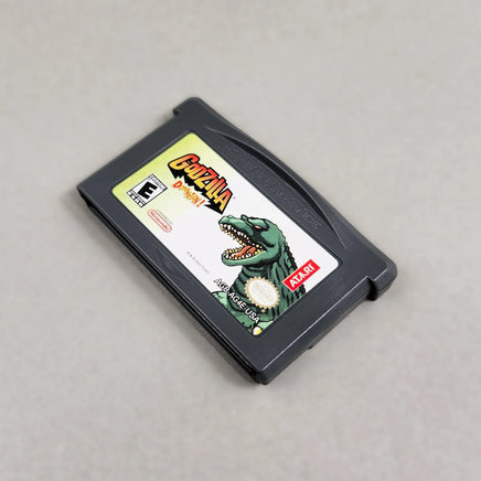 Godzilla Domination! for Game Boy Advance - Close up view of the front of the game cartridge shown at an angle, very good condition