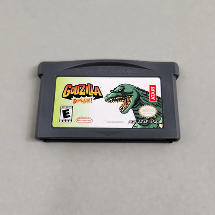 Godzilla Domination! for Game Boy Advance - Front on view of the official game cartridge displaying the game label artwork and title, very good condition
