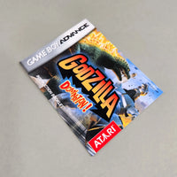 Godzilla Domination! for Game Boy Advance - Front view of the official game instruction manual showing Godzilla artwork and game logo, very good condition
