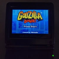 Godzilla Domination! for Game Boy Advance - View of the game shown working on a GBA system with the screen showing the game's title screen and "Press Start", very good condition