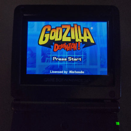 Godzilla Domination! for Game Boy Advance - View of the game shown working on a GBA system with the screen showing the game's title screen and "Press Start", very good condition