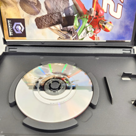 ATV Quad Power Racing 2 Nintendo GameCube Like New CIB - Open case with close up view of scratch free game disc surface, like new condition