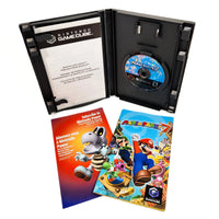 Nintendo GameCube Mario Party 7 game package shown open, with the black game case, disc, instruction booklet, and cover insert on a white background.