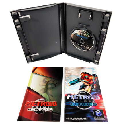 Metroid Prime 2 Echoes video game package shown open with the game disc inside, plus the front cover of the instruction booklet below on a white background.