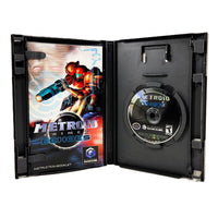 Nintendo GameCube Metroid Prime 2: Echoes game case opened to show the instruction booklet on the left and the game disc on the right, photographed on a white background.