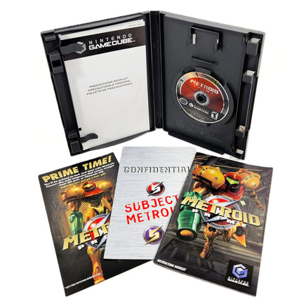 Metroid Prime Nintendo GameCube Very Good - View of game case, disc, instruction booklet, and other included pamphlets for the full CIB official game release by Nintendo for GCN