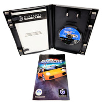 Nintendo GameCube 'Need for Speed Hot Pursuit 2' game package shown open with the black plastic case, a blue game disc, a printed insert card, and the front cover  of instruction booklet below on a white background.