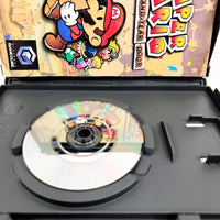Paper Mario Thousand Year Door Nintendo GameCube Good - Open game case with close up view of scratch free game disc surface