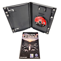 Star Wars Rogue Leader video game package shown open with the game disc inside a black plastic case, plus the instruction booklet in front on a white background.