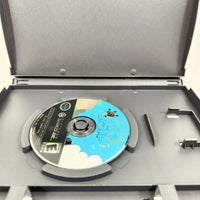 Super Mario Sunshine [Player's Choice] Nintendo GameCube - Open game case with close up view of the game disc artwork with some flaking shown