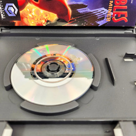 The Incredibles: Rise of the Underminer - Open game case with close up view of scratch free game disc surface