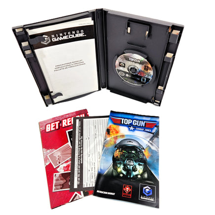 Top Gun Combat Zones Nintendo GameCube Very Good - Open Case With Disc, Instruction Manual, Registration Cart, Mini Poster on a white background