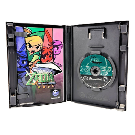The Legend of Zelda: Four Swords Adventures - Nintendo GameCube - Open case displaying contents, good condition