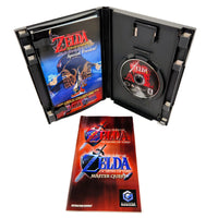 Nintendo GameCube special edition release of The Legend of Zelda: Ocarina of Time - Master Quest, shown in an open black plastic case with the game disc, game case insert, and instruction booklet on a white background.
