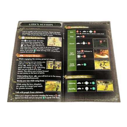 The Legend Of Zelda Twilight Princess Nintendo GameCube Very Good - Open view of the game's instruction manual showing the centerfold pages and displaying the staple binding intact.