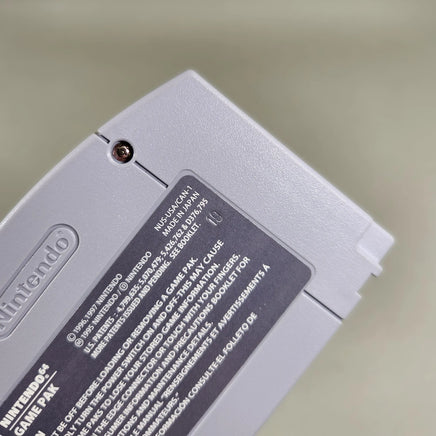 GoldenEye 007 for Nintendo 64 - Close-up of authentic N64 cartridge rear label factory number stamp, very good condition