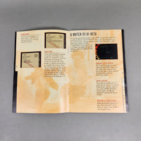 GoldenEye 007 for Nintendo 64 - Original N64 instruction manual opened to center pages showing intact staples, very good condition
