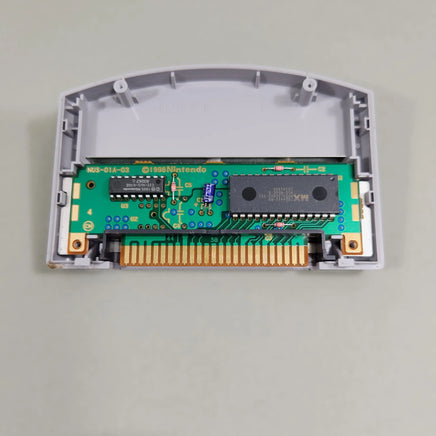 Disney's Donald Duck: Goin' Quackers for Nintendo 64 - Opened N64 Game Pak showing original Nintendo circuit board and chips, very good condition, loose