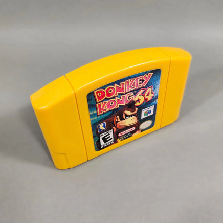 Donkey Kong 64 for Nintendo 64 - N64 cartridge angled view displaying top edge and front label, good condition, loose