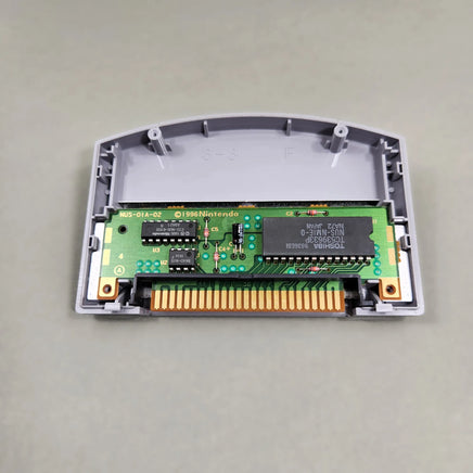 Mission: Impossible for Nintendo 64 - Opened game cartridge displaying authentic Nintendo board and components, very good condition, loose