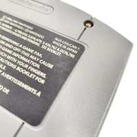 Super Mario 64 Players Choice Nintendo 64 Very Good CIB - Close up view of number stamp on back cartridge label proving authentic release