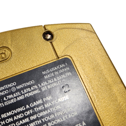 Zelda Majora's Mask Holographic Collector's Edition Nintendo 64 Like New Loose - Close up view of back label on cart showing stamped number to prove the cart is genuine Nintendo released cartridge