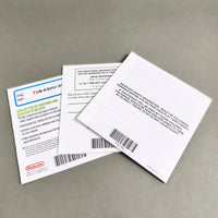 Mario Kart DS for Nintendo DS - Rear view of Nintendo DS game packaging materials on a neutral gray background, including a white Wi-Fi booklet, a white product card, and a green promotional insert featuring Bowser and the text 'Nintendo Power'.