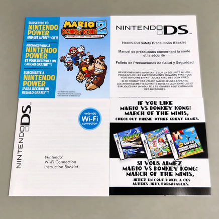 Nintendo DS health and safety precautions booklet and booklet for Nintendo Wi-Fi Connection, featuring French and English text with Mario and Donkey Kong graphics.