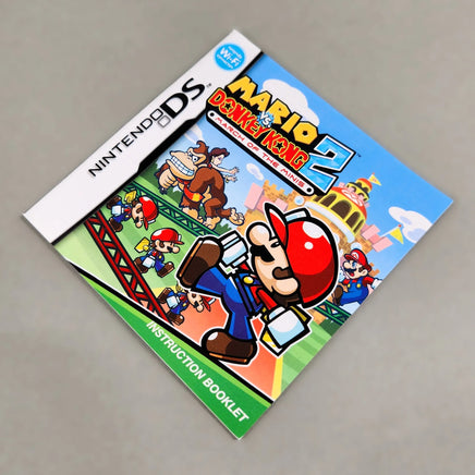 Mario vs. Donkey Kong 2: March of the Minis for Nintendo DS - Authentic instruction booklet front artwork, good condition