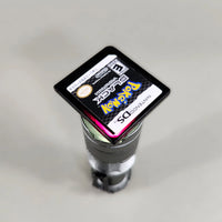 Pokémon Black Version for Nintendo DS - Nintendo DS Pokémon game cartridge held over a light source showing red translucent tint, very good condition, loose