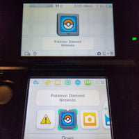 Nintendo DS game screens displaying the Pokémon Diamond and Nintendo app, with the Pokéball icon highlighted on a dark background.