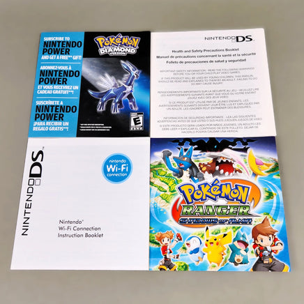 Nintendo DS Pokémon Diamond Version and Wi-Fi Connection instruction booklet set, showing the front cover, back cover, and included card on a light gray background.