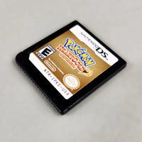Pokémon HeartGold Version for Nintendo DS - View of game cartridge front shown at an angle, good condition, loose