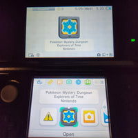 A Nintendo 3DS handheld console showing Pokémon Mystery Dungeon: Explorers of Time on the screen, with a menu item labeled 'Pokémon Mystery Dungeon: Explorers of Time Nintendo' visible on both the home screen and the upper display.
