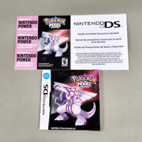Nintendo DS Pokémon Pearl Version instruction booklet and health and safety precautions booklet set, displayed on a neutral gray background.