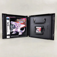 Pokémon Pearl Version for Nintendo DS - Open case displaying contents of manual and Nintendo DS game cart, very good condition