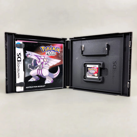 Pokémon Pearl Version for Nintendo DS - Open case displaying contents of manual and Nintendo DS game cart, very good condition