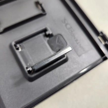 Pokémon Pearl Version for Nintendo DS - Close-up of authentic Nintendo DS cartridge top indent used for verification, very good condition