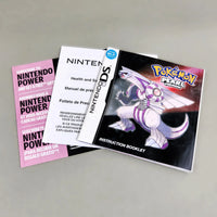 Pokémon Pearl Version for Nintendo DS - Nintendo DS Health and Safety Manual set with an instruction booklet, a white manual, and a pink subscription card on a neutral gray background.