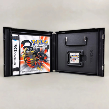 Pokémon Platinum Version for Nintendo DS - Inside case layout with contents displaying instruction booklet and DS game cart, very good condition