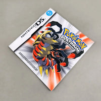 Nintendo DS Pokémon Platinum Version instruction booklet with a character illustration of a metallic scorpion-like Pokémon on the cover, photographed on a plain light gray surface.