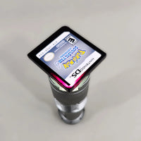 Pokémon SoulSilver Version for Nintendo DS - Nintendo DS Pokémon game cartridge held over a light source showing red translucent tint, very good condition, loose