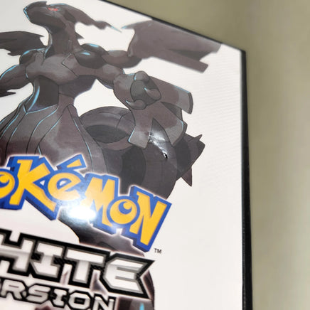 Pokémon White Version for Nintendo DS - Close up view of blemish on front cover of game case and artwork